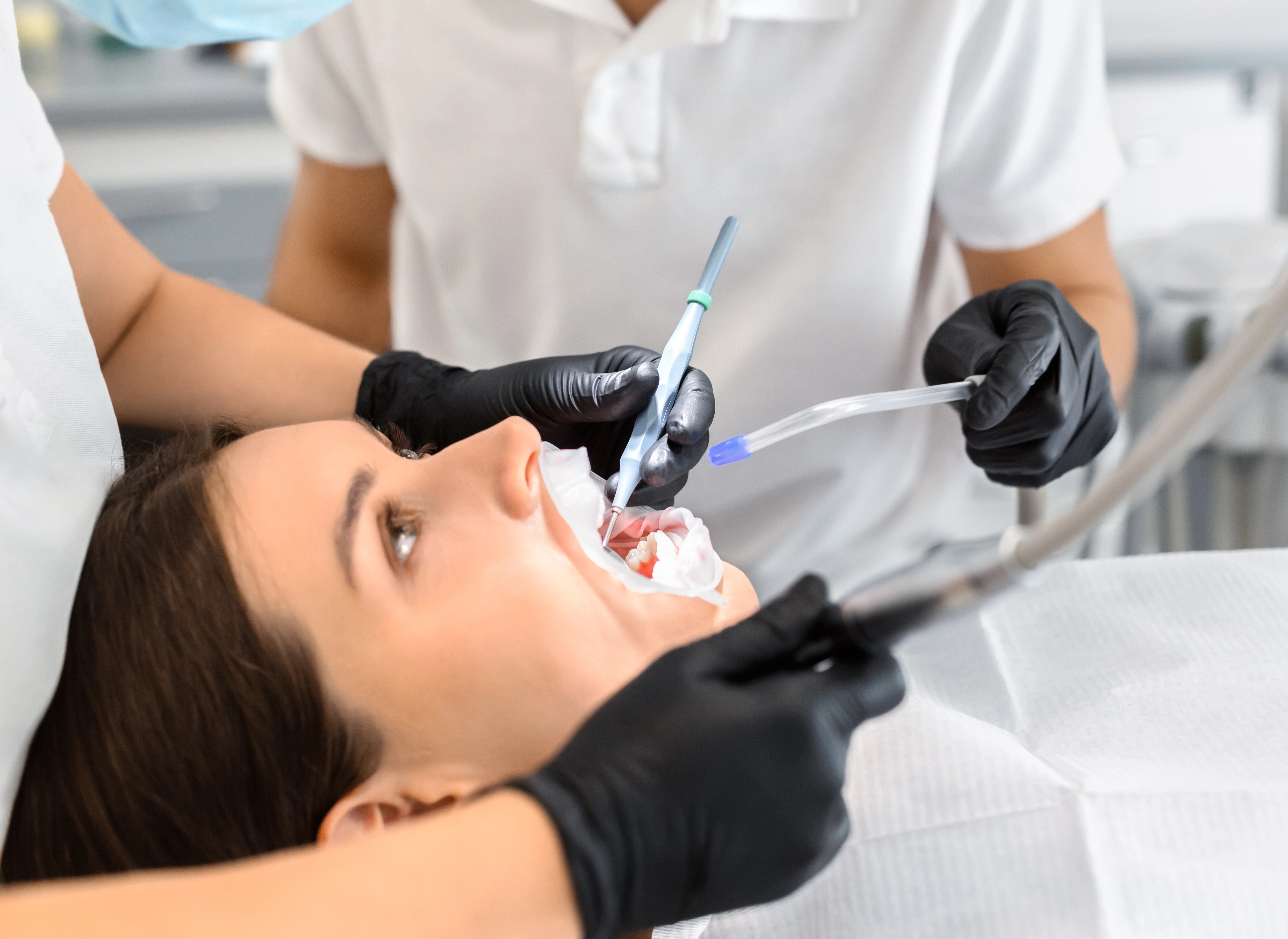 Women Having Full Mouth Dental Implants Treatment