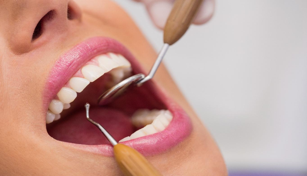 stages of a loose tooth in adults